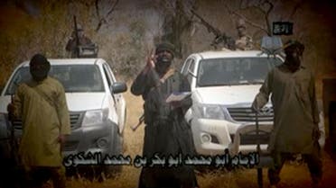  In this screen grab image taken on February 9, 2015 from a video made available by Islamist group Boko Haram, leader Abubakar Shekau (C) makes a statement at an undisclosed location.(AFP)