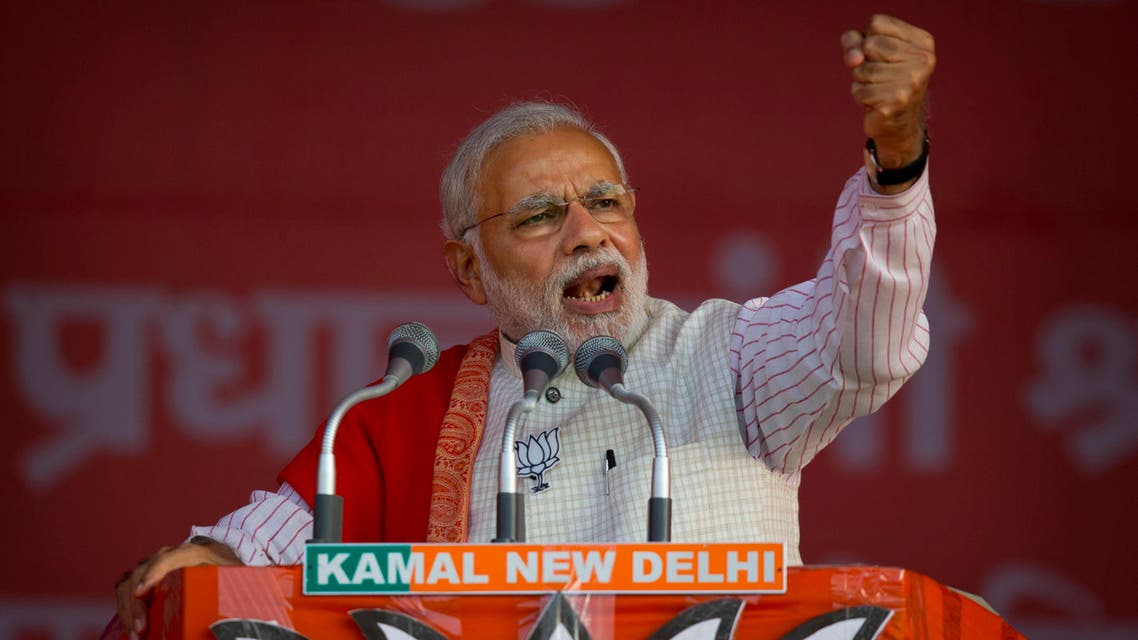 Indian Prime Minister Narendra Modi addresses an election campaign rally for his Bharatiya Janata Party (BJP) ahead of Delhi state election in New Delhi, India, Wednesday, Feb. 4, 2015. Delhi goes to the polls on Feb. 7. (AP Photo/Saurabh Das)