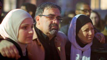 Namee Barakat with his wife Layla (R) and daughter Suzanne, family of shooting victim Deah Shaddy Barakat, attend a vigil on the campus of the University of North Carolina in Chapel Hill, North Carolina February 11, 2015. Reuters