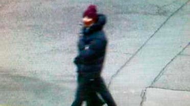 A man who passed a camera in the area shortly after two suspects had fled in a car following a shooting in Copenhagen, is seen in this police still image taken from video shot February 14, 2015. (Reuters)
