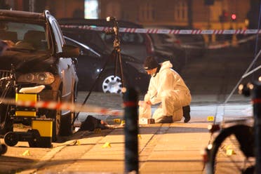 Forensic investigators are seen at the site of a shooting in Copenhagen February 14, 2015. (Reuters)