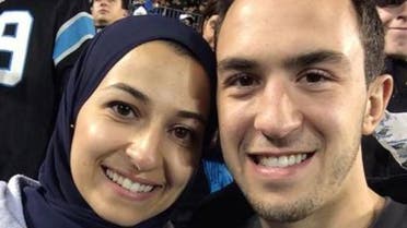 Yusor Abu-Salha and her husband Deah Barakat at an American football match. (Photo courtesy of Twitter)