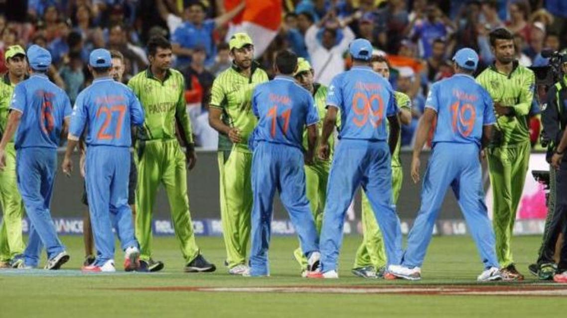 India's World Cup cricket team shake hands with Pakistan's team at the end of their first 2015 World Cup Cricket match n Adelaide, February 15, 2015. (Reuters)