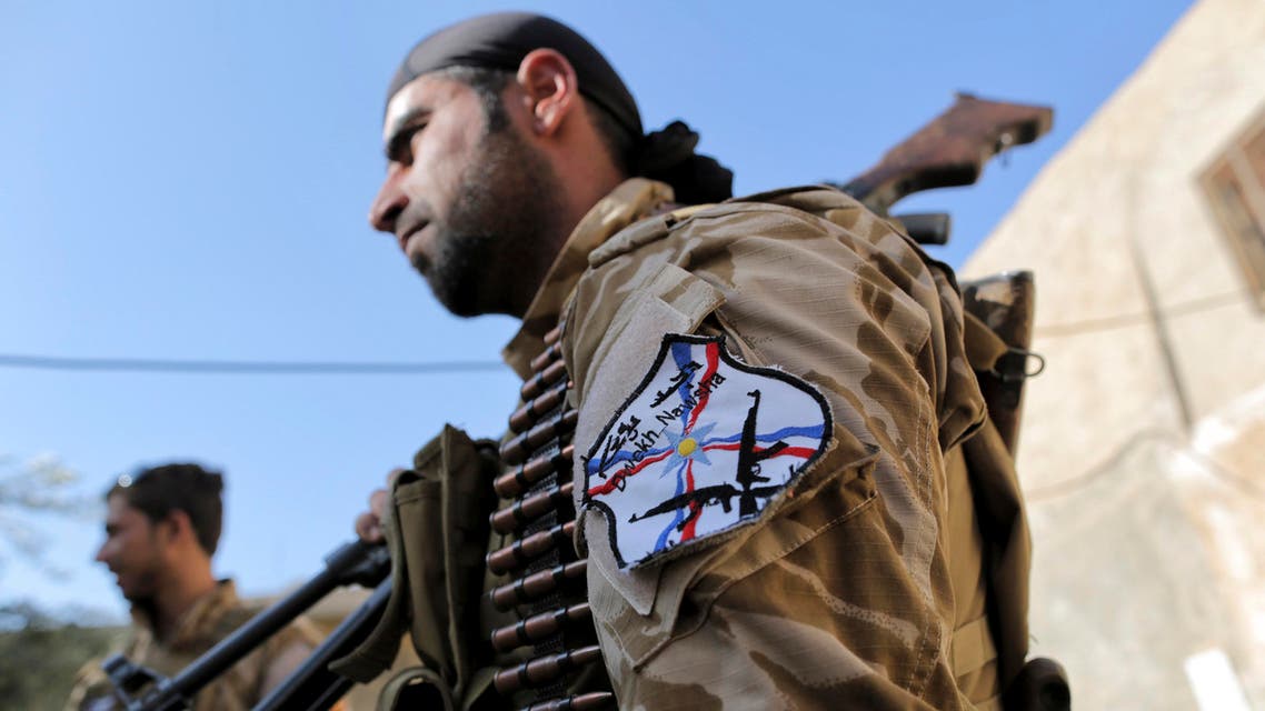 Dwekh Nawsha militia members stand guard in the Christian village of Bakufa, 30 kilometers (18.6 miles) north of Mosul, Iraq, Wednesday, Nov. 12, 2014. (File photo: AP)
