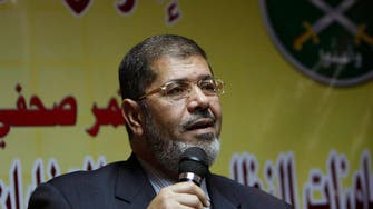 Mursi, 24 others to be tried for insulting Egypt judiciary