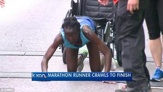 Kenyan runner crawls to finish line at Austin marathon 