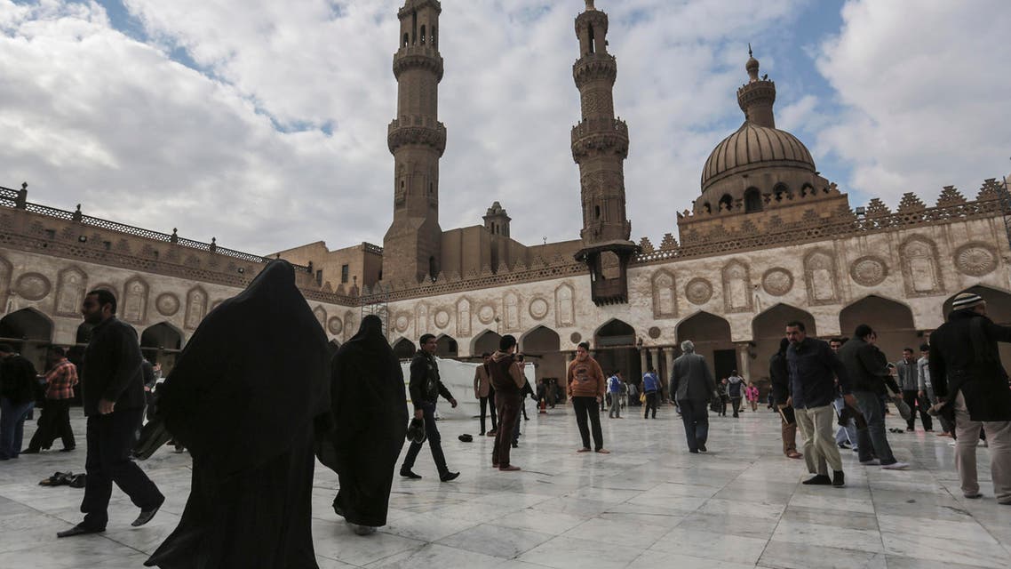 Muslim worshippers walk in the courtyard of Al-Azhar Mosque in the Islamic Cairo neighborhood after Friday noon prayers in Cairo, Egypt, Friday, Jan. 9, 2015. (AP)