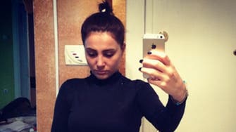 Turks post selfies in black to commemorate slain woman