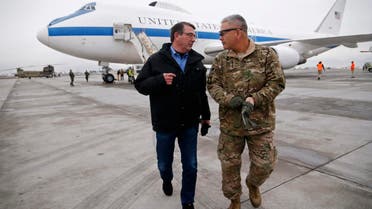 U.S. Secretary of Defense Ash Carter (L) walks with U.S. Army General John Campbell, who greeted him upon his arrival at Hamid Karzai International Airport in Kabul, Afghanistan February 21, 2015. (Reuters)