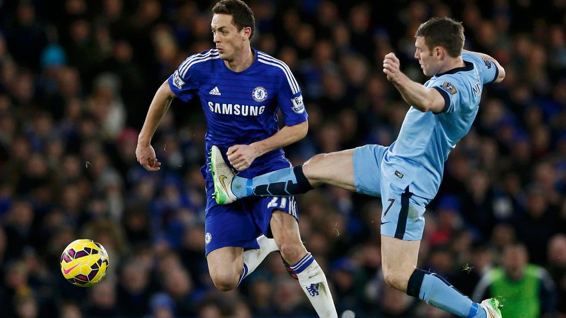 Chelsea's Nemanja Matic (L) is challenged by Manchester City's James Milner during their English Premier League soccer match at Stamford Bridge in London Jan. 31, 2015. (Reuters)