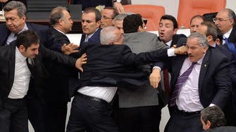 Fists fly in rowdy 18-hour Turkey parliament session 