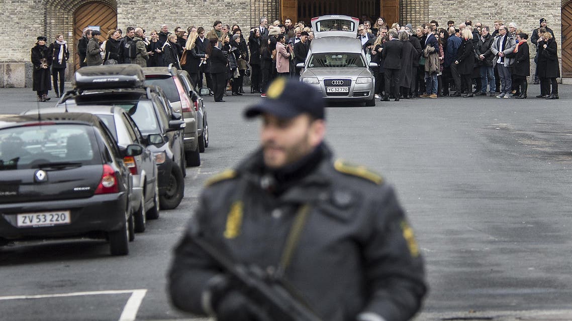 The coffin of Danish filmmaker Finn Noergaard who was killed in one of the two attacks in Copenhagen, is brought out after the funeral service at Grundvigs Church, in Copenhagen, Feb. 24, 2015. (AP)