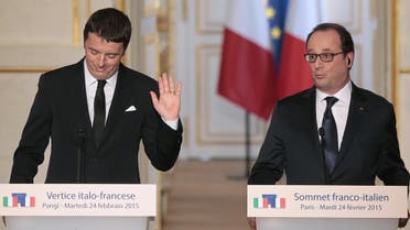  Italian Prime Minister Matteo Renzi (L) and French President Francois Hollande (R) give a press conference during a Franco-Italian summit at the Elysee Palace on Feb. 24, 2015 in Paris. (AFP)