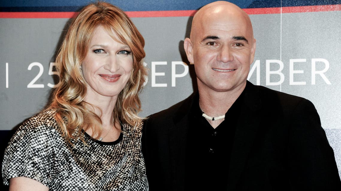 Steffi Graf, left, and Andre Agassi attend Longines Los Angeles Masters on Saturday, Sept. 27, 2014, in Los Angeles. (AP)