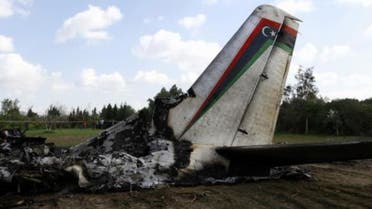  The wreckage of a Libyan military plane that crashed near Grombalia town, south of Tunis, is seen February 21, 2014. reuters