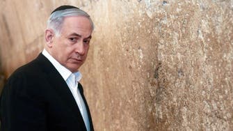 Netanyahu heads to Washington despite furor 