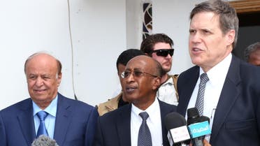 President Abdrabuh Mansur Hadi (L) standing with American ambassador to Yemen Matthew Tueller (L) during a press conference in Aden. (AFP)