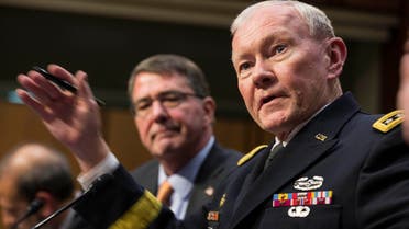 U.S. Defense Secretary Ash Carter (L) listens as Chairman of the Joint Chiefs of Staff Army General Martin Dempsey testifies before a Senate Armed Services Committee in Washington March 3, 2015. (Reuters)
