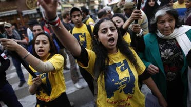 Egyptians march in downtown Cairo to mark International Women's Day on March 8, 2013. 