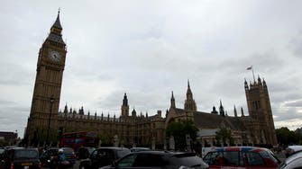 Man arrested after night on British Parliament roof 