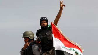 Iraqi forces push toward Tikrit’s center 