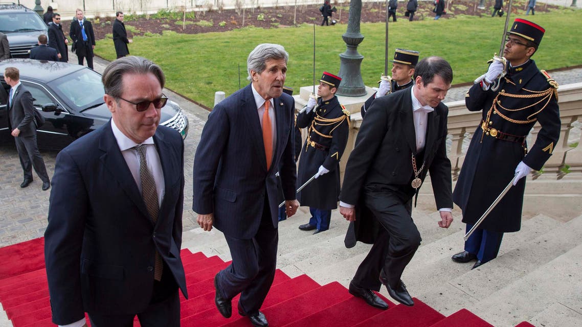 U.S. Secretary of State John Kerry (2nd L) arrives to meet France's Foreign Minister Laurent Fabius in Paris March 7, 2015. (Reuters)
