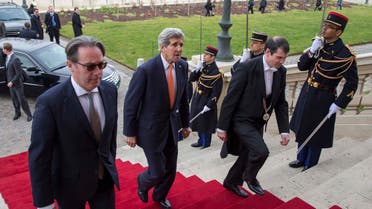 U.S. Secretary of State John Kerry (2nd L) arrives to meet France's Foreign Minister Laurent Fabius in Paris March 7, 2015.  (Reuters)