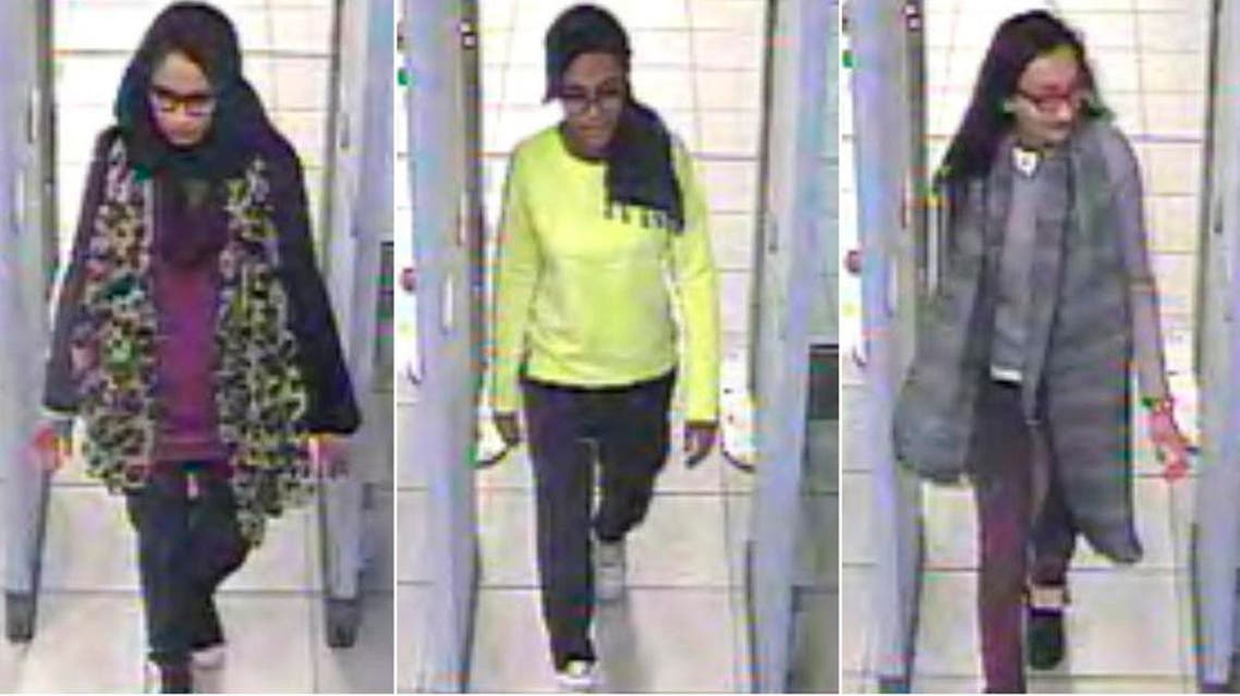 British teenage girls Shamima Begun, Amira Abase and Kadiza Sultana (L-R) walk through security at Gatwick airport before they boarded a flight to Turkey on Feb. 17, 2015. (Reuters)