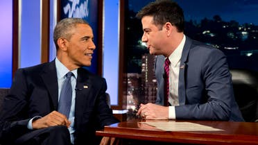 President Barack Obama talks with Jimmy Kimmel during a break in taping on Jimmy Kimmel Live, in Los Angeles Thursday, March 12, 2015. AP