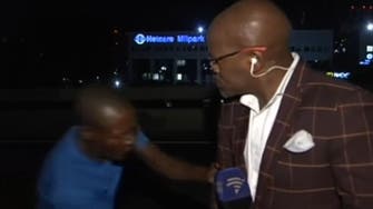South African reporter mugged while on camera