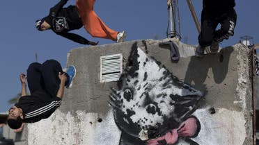 Palestinian youth practice Parkour amid Gaza ruins