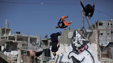 Palestinian youth practice Parkour amid Gaza ruins