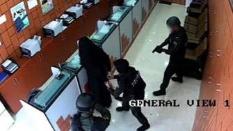 Video: Veiled woman tries to rob Abu Dhabi money exchange with toy gun