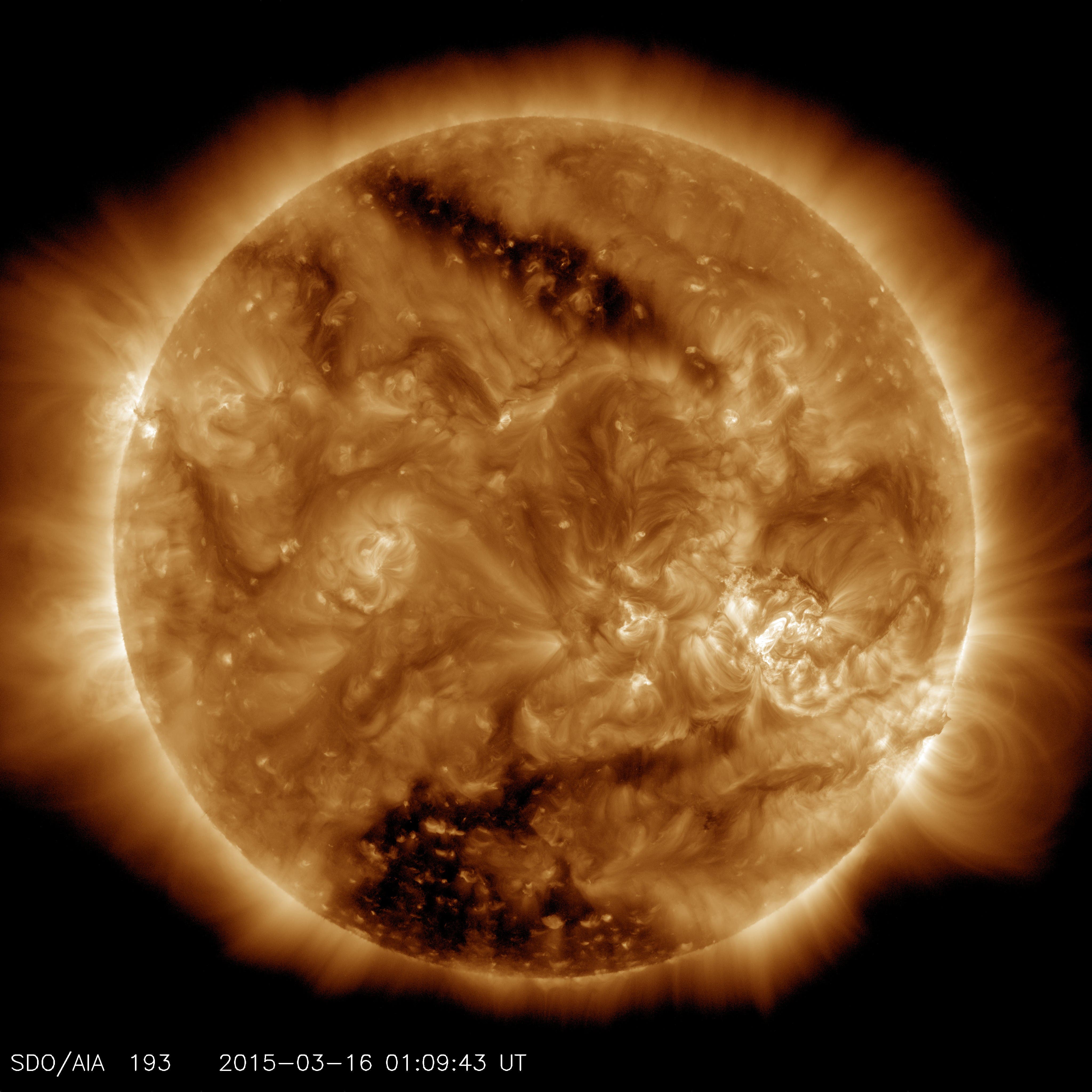 Space agency spots 'holes' in sun's surface (Courtesy of NASA)