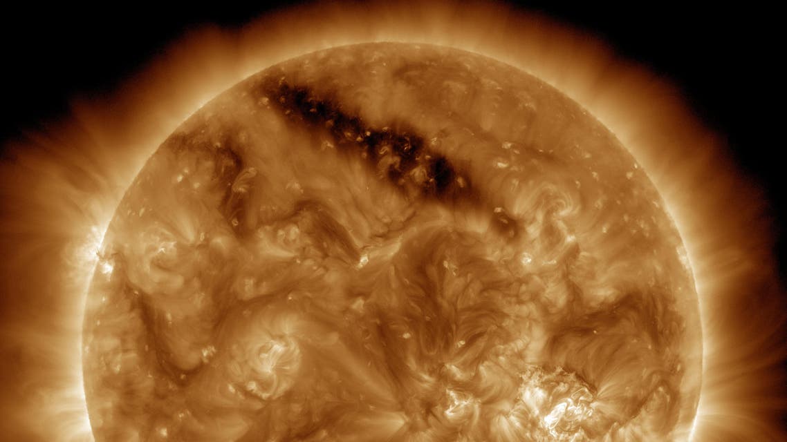 Space agency spots 'holes' in sun's surface (Courtesy of NASA)
