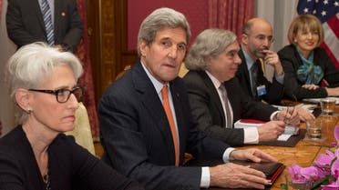 US Secretary of State John Kerry, centre, sits at the negotiating table with U.S. Under Secretary for Political Affairs Wendy Sherman, left and from centre right, U.S. Secretary of Energy Ernest Moniz, Robert Malley and from the U.S. National Security Council and European Union Political Director Helga Schmid during a meeting with Iran's Foreign Minister Javad Zarif over Iran's nuclear program, in Lausanne, Switzerland, Thursday, March 19, 2015. AP