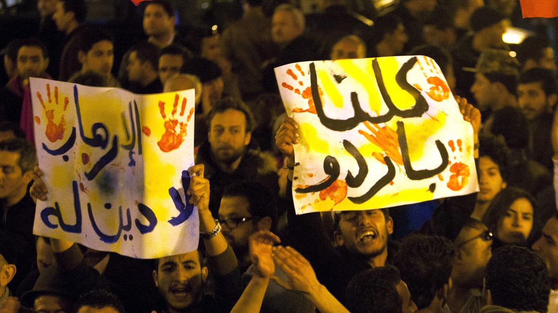 Tunisians gather at Habib Bourguiba avenue to show solidarity with the victims of the attack at a museum in Tunis, Wednesday, March 18, 2015. (AP)