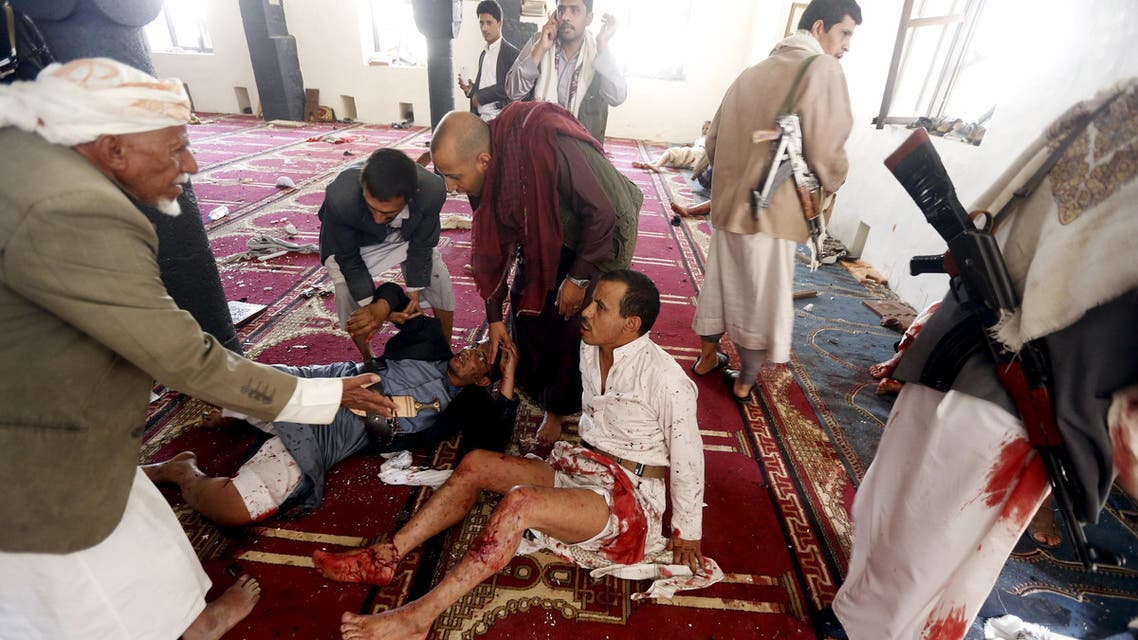  People react after being injured in bomb attack inside a mosque in Sanaa March 20, 2015. (AP)