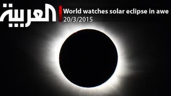 World watches solar eclipse in awe