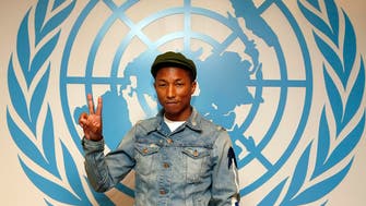‘Happy’ Pharrell mobbed at U.N. General Assembly 