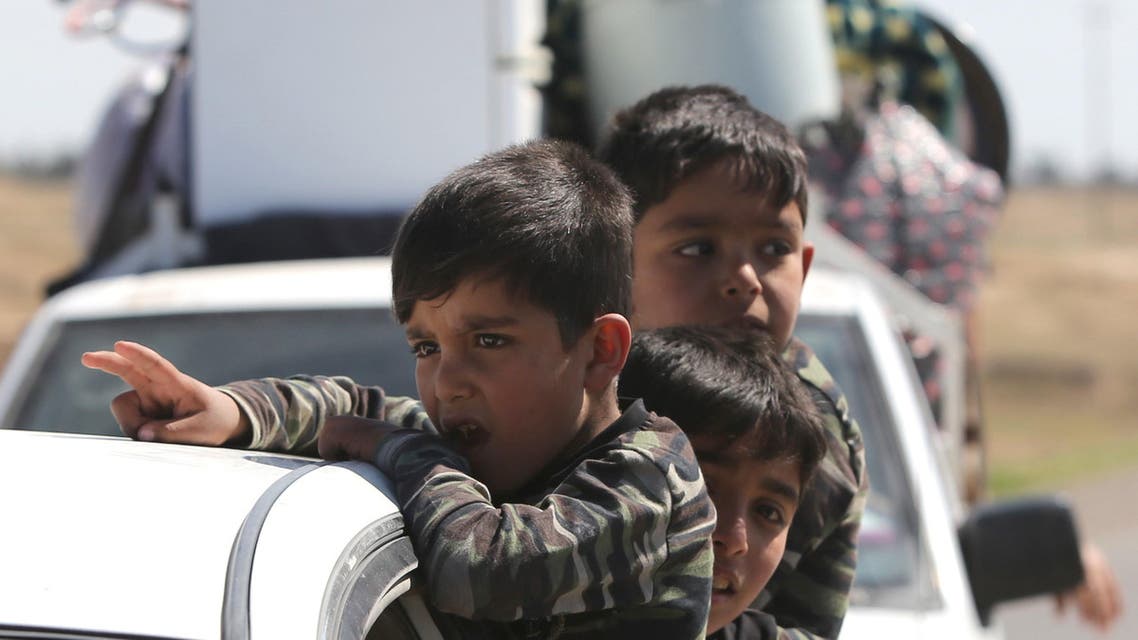 Iraqi Sunni refugees return back to the Al-Alam town, northeast of the multi-ethnic Iraqi city of Tikrit, on March 17, 2015. (File Photo: AFP)