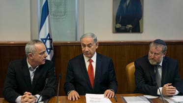 Yuval Steinitz (left) Netanyahu (Center) Avichai Mandelblit (Right) Reuters