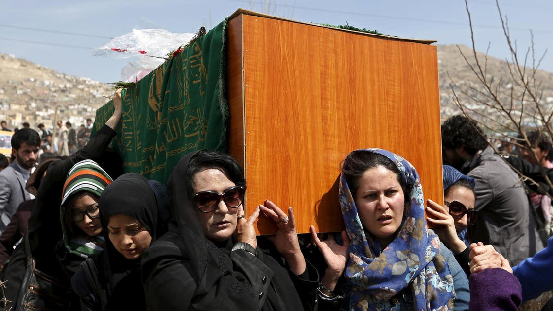 Afghan women's rights activists carry the coffin of Farkhunda, an Afghan woman who was beaten to death and set alight on fire on Thursday, during her funeral ceremony in Kabul March 22, 2015. (Reuters)