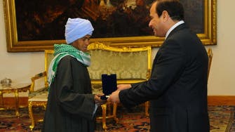 Sisi honors mother who had to dress as a man for work