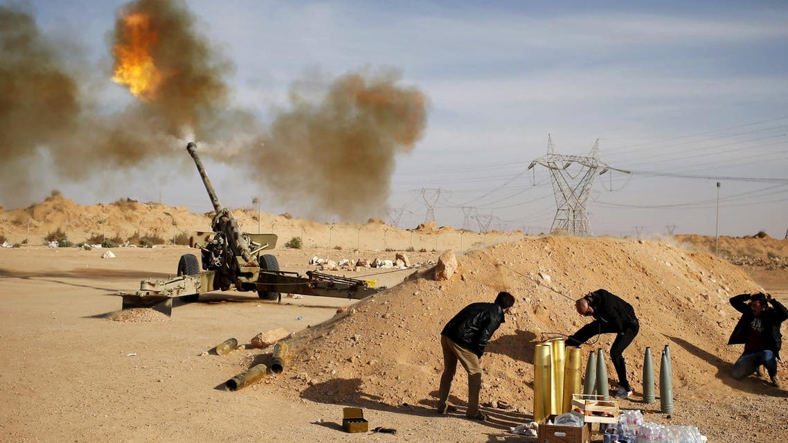 Libya Dawn fighters fire an artillery cannon at IS militants near Sirte March 19, 2015. (Reuters)