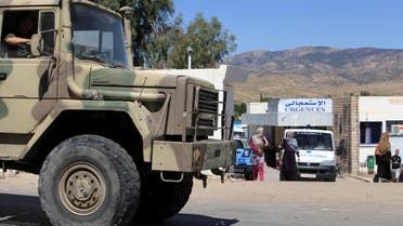 A military truck parks outside the hospital of Kasserine, near the Algerian border, Thursday, July 17, 2014. AP