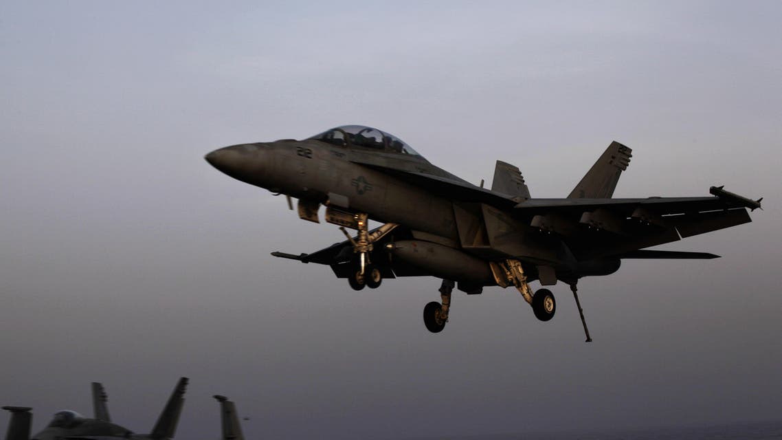 In this Aug. 10, 2014 photo, an aircraft lands after missions targeting the ISIS in Iraq from the deck of the U.S. Navy aircraft carrier USS George H.W. Bush in the Gulf. (AP)