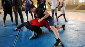 Japan grapples to ready Sudan wrestlers for Olympics