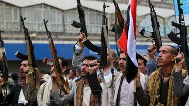 Shiite rebels, known as Houthis, hold up their weapons to protest against Saudi-led airstrikes, during a rally in Sanaa, Yemen, Thursday, March 26, 2015. (AP)