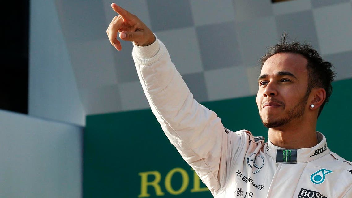Mercedes Formula One driver Lewis Hamilton of Britain celebrates his victory on the podium after the Australian F1 Grand Prix at the Albert Park circuit in Melbourne March 15, 2015. (File: Reuters)